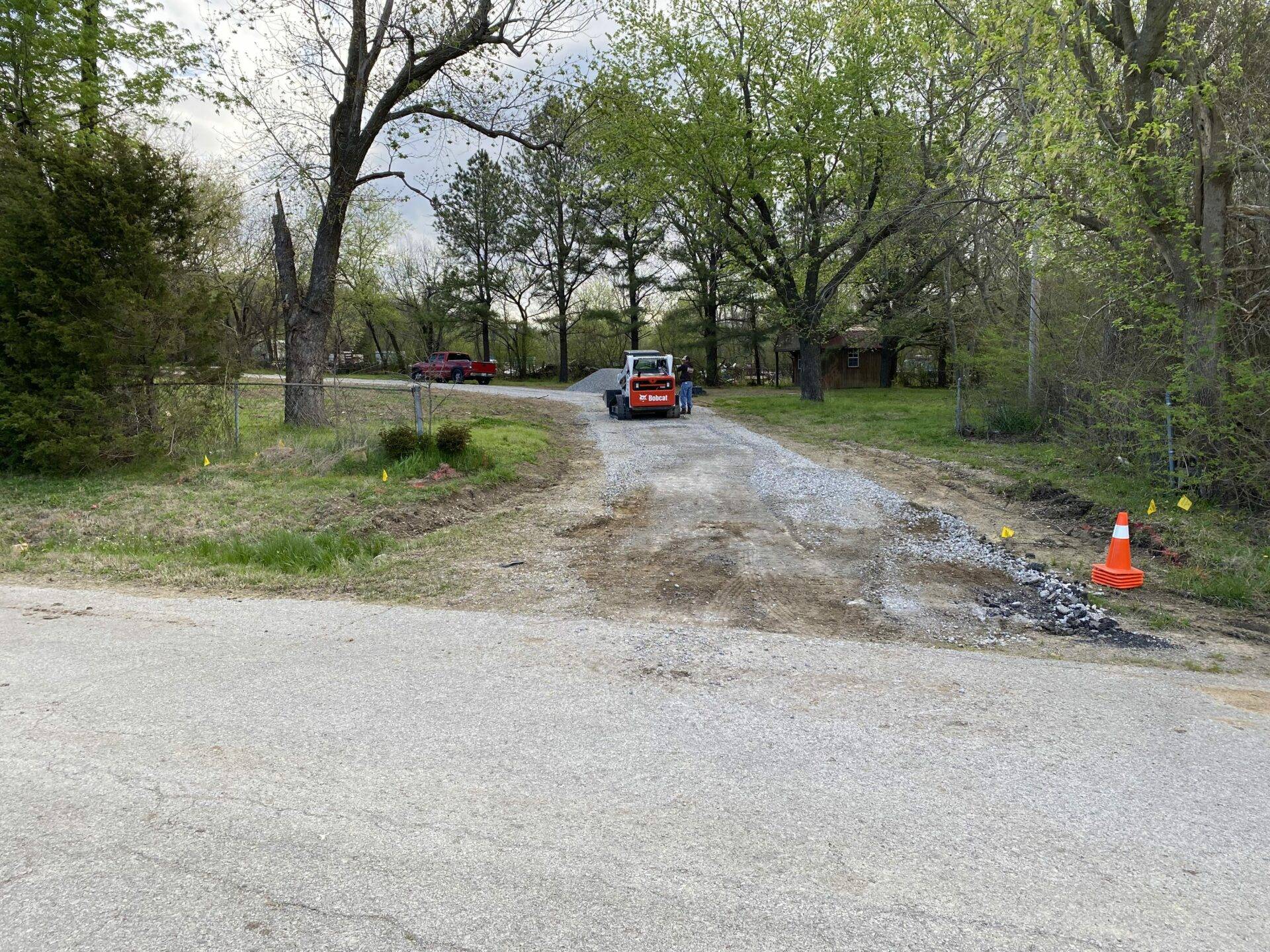 concrete driveway and retaining wall before, West Tulsa OK